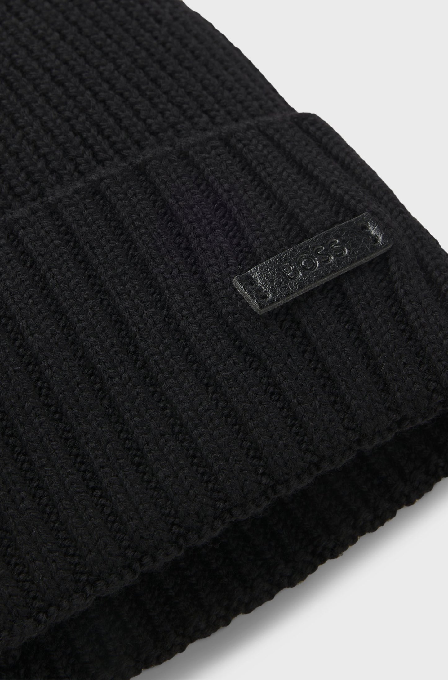 Rib-knit virgin-wool beanie with logo plaque